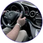 A photo clock and car steering wheel